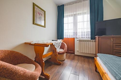 Ένα ή περισσότερα κρεβάτια σε δωμάτιο στο Budget room - Tanie pokoje BURTEK