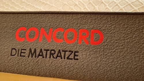 a close up of the word conventional parachute on a mattress at Bad Wimpfen Altstadt - ruhige, private Unterkunft in Bad Wimpfen