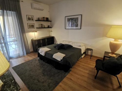 En eller flere senger på et rom på Appartamento Greek Theater POSTO AUTO