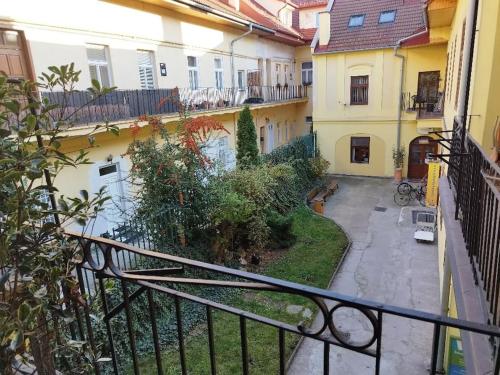 a view of a courtyard from a balcony of a building at Eliza Old Town Apartment in Košice