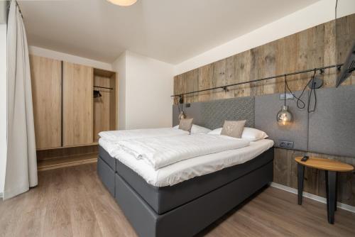Cama o camas de una habitación en Stockinggut by AvenidA