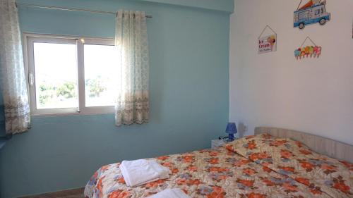 Кровать или кровати в номере Summer scoop studio by EvaGstays