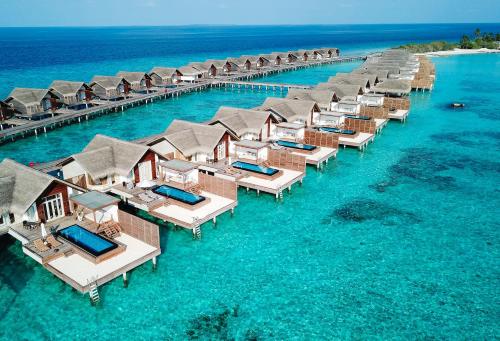 an aerial view of a resort in the water at Sirru Fen Fushi Private Lagoon Resort in Shaviyani Atoll