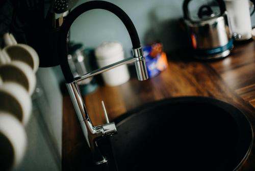 Η κουζίνα ή μικρή κουζίνα στο Cozy apartment in city center