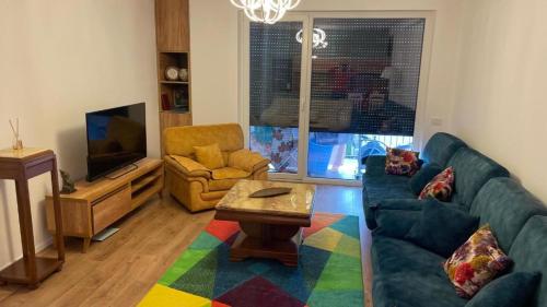 TV a/nebo společenská místnost v ubytování SUNNY HILL Apartament Pristina Kosovo