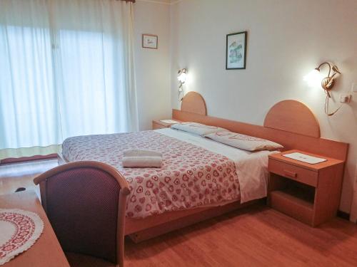Postel nebo postele na pokoji v ubytování Hotel Edelweiss