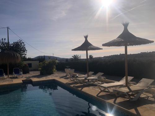 Πισίνα στο ή κοντά στο Private house ' Estufa' with a beautiful view