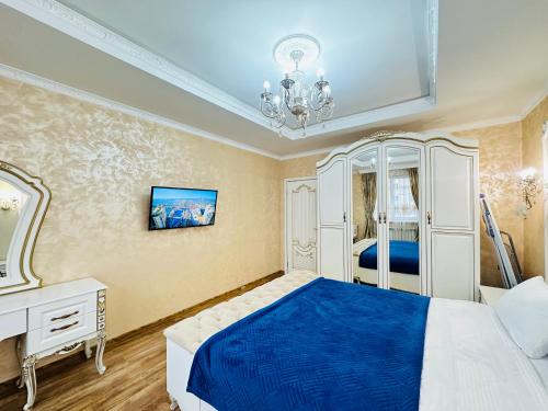 Katil atau katil-katil dalam bilik di Mega Tower Almaty, a residential complex