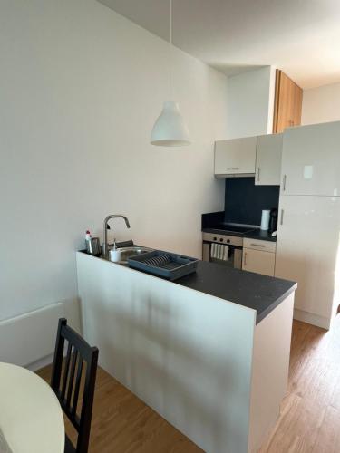 Kuchyň nebo kuchyňský kout v ubytování AMP Apartman - Siófok