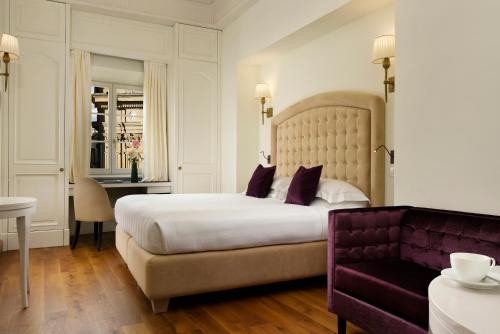 Katil atau katil-katil dalam bilik di San Firenze Suites & Spa