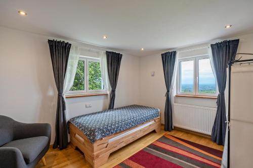 Ένα ή περισσότερα κρεβάτια σε δωμάτιο στο Ferienhaus S' Äckerle