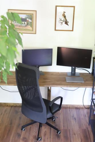 TV a/nebo společenská místnost v ubytování Apartament w stylu boho 60m2