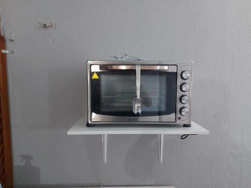 TV i/ili multimedijalni sistem u objektu Hostal El Fogon De Felisa