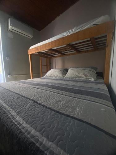 Ένα ή περισσότερα κρεβάτια σε δωμάτιο στο Hostel Sol da Barra
