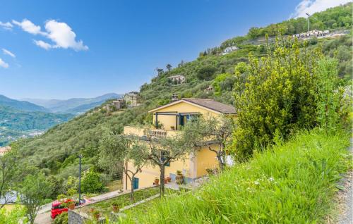 a house on the side of a mountain at Lovely Apartment In Cogorno With Wifi in Cogorno