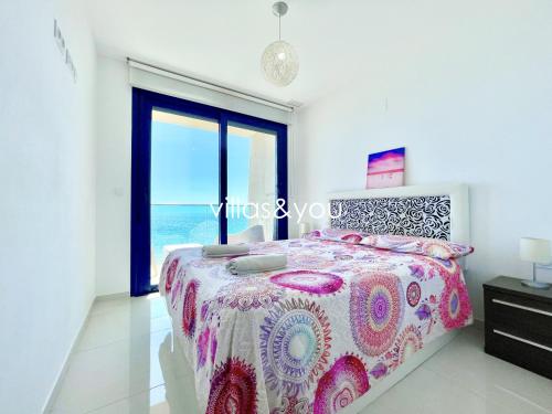 Postel nebo postele na pokoji v ubytování Sea Senses Punta Prima by Villas&You