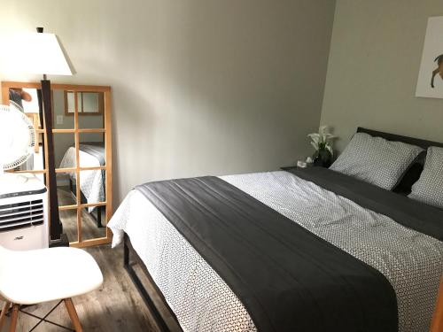 Postel nebo postele na pokoji v ubytování Au Pied de la Montagne CITQ29570Quatre