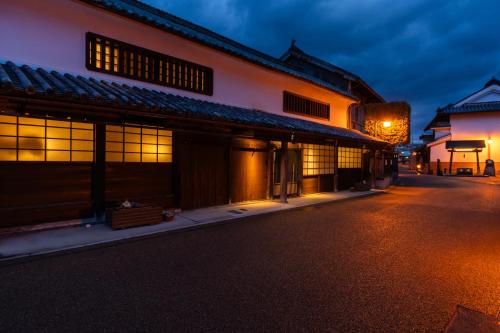 an empty street in an old building at night at PAYSAGE MORIGUCHI in Mima