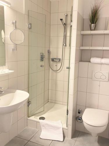 Ένα μπάνιο στο Appartementhaus Westerloog Inselherz Appartement 3 mit Balkon