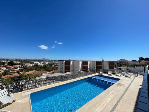 a swimming pool on top of a building at Alpen1 Finca Simo in Peniscola