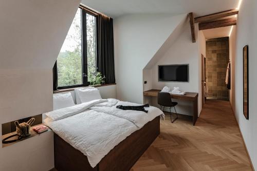 Postel nebo postele na pokoji v ubytování Lukas Kapeller Hotel und Restaurant