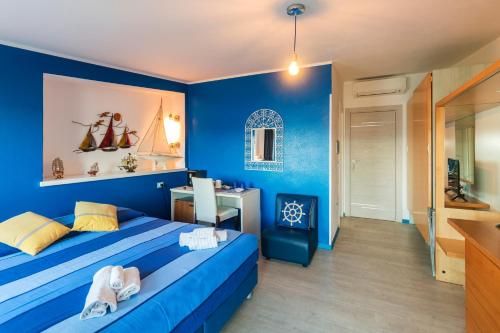 Кровать или кровати в номере La Favorita Hotel