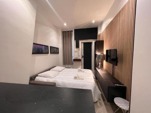 Televízia a/alebo spoločenská miestnosť v ubytovaní 269 Suite Pereire - Superb apartment in Paris
