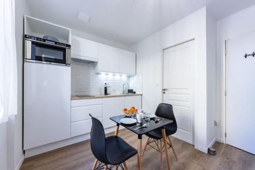 Dapur atau dapur kecil di Le Cocon Agenais - Appart'Hotel SPA - Clim - Melina & Alfred