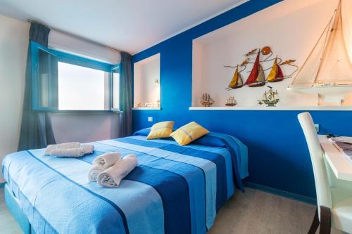 Кровать или кровати в номере La Favorita Hotel