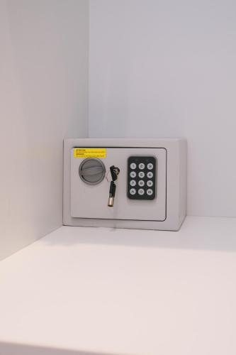 a remote control sitting on top of a shelf at La Finestrella in Bari