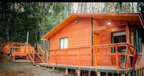 a wooden cabin in the middle of a forest at Cabañas El Mirador de Recinto in Recinto