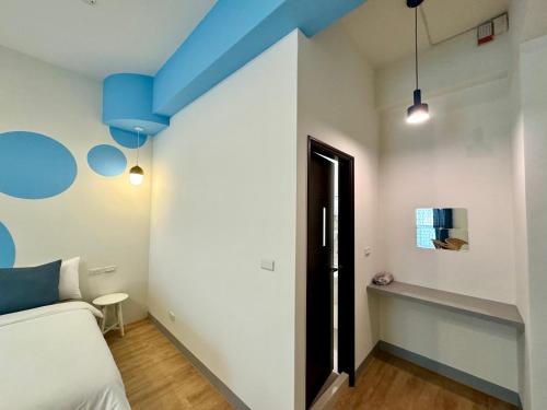 Postel nebo postele na pokoji v ubytování WinXin House