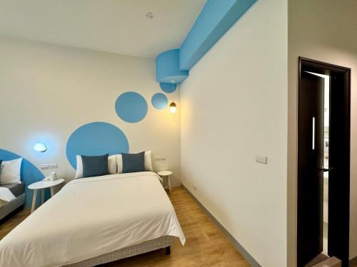 Postel nebo postele na pokoji v ubytování WinXin House