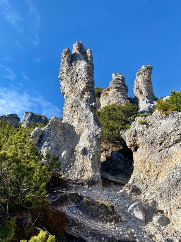 a group of rock formations on a mountain at Studio Sinabell - Apartment mit Bergblick und Balkon in Ramsau am Dachstein