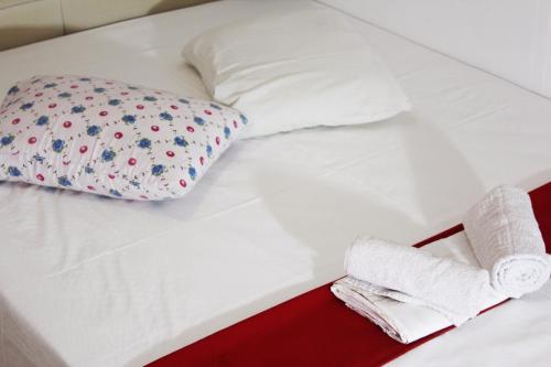 Postel nebo postele na pokoji v ubytování Hotel Erisun
