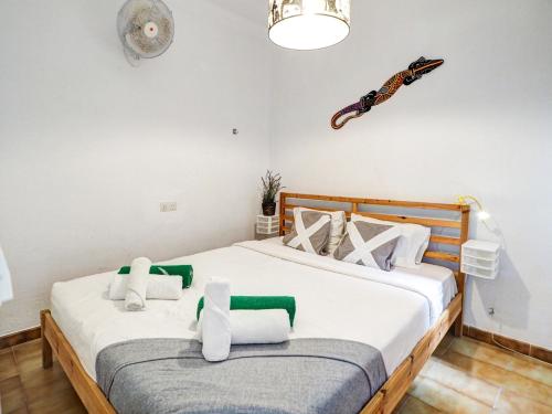 a bedroom with two beds with white pillows at Espalter Onyx by Hello Homes Sitges in Sitges