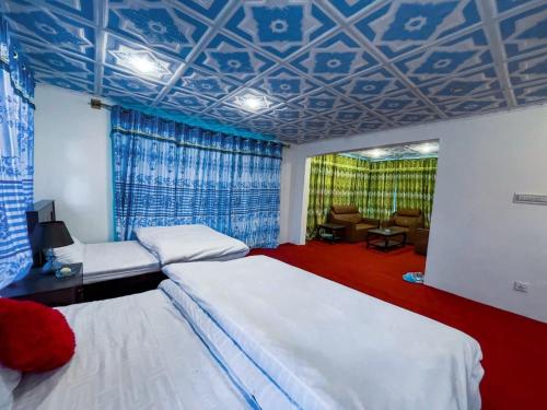 Ένα ή περισσότερα κρεβάτια σε δωμάτιο στο Hill icon Resort & Restaurant