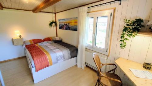 Ein Bett oder Betten in einem Zimmer der Unterkunft Nisihof, Seeblick Family or Single
