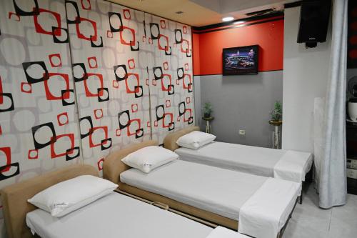 Postel nebo postele na pokoji v ubytování Hotel Hostel Bonito