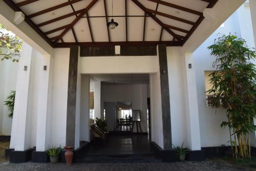 a view of the front of a house at Sanmali Beach Hotel in Marawila