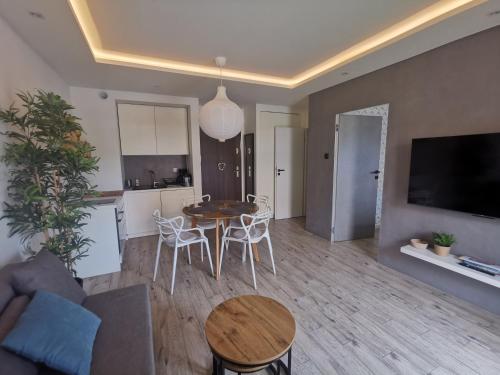 TV a/nebo společenská místnost v ubytování Apartament Sereno, Parking Gratis, Brak Kaucji