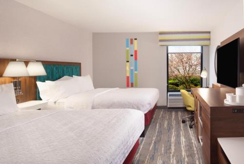 Ένα ή περισσότερα κρεβάτια σε δωμάτιο στο Hampton Inn Athens