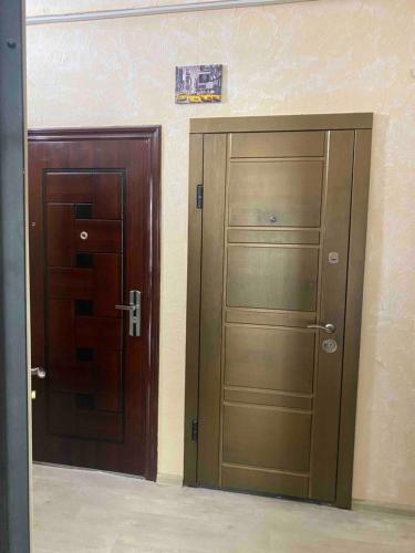 two doors in a room next to each other at Елисаветинская 15 in Odesa