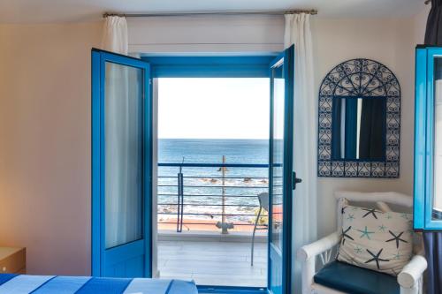 Кровать или кровати в номере La Favorita Hotel