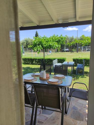 Κήπος έξω από το Harmony Luxury House