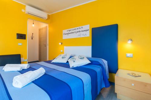 Кровать или кровати в номере La Favorita Hotel