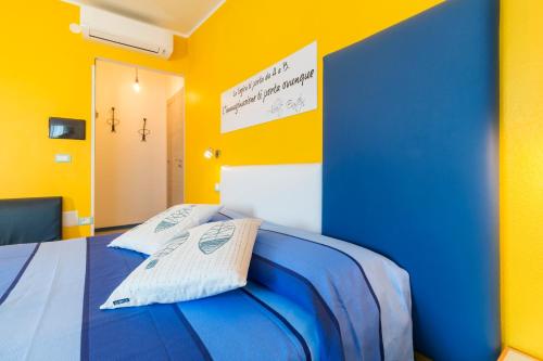 Кровать или кровати в номере La Favorita Hotel