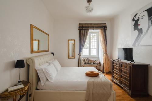 Ένα ή περισσότερα κρεβάτια σε δωμάτιο στο B&B Ibiscus