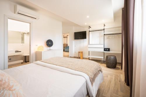 Ένα ή περισσότερα κρεβάτια σε δωμάτιο στο Suimi's Hotel