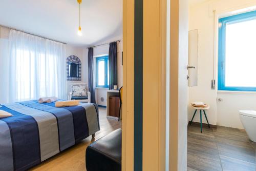 Кровать или кровати в номере La Favorita Hotel